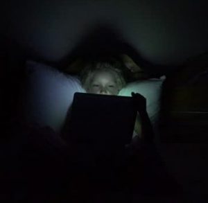 Kids repeatedly use a tablet through out the night